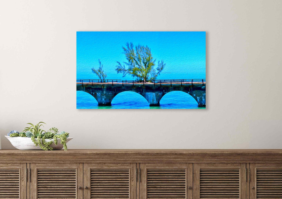 Fred artwork at 40"x24" above a coastal cabinet.